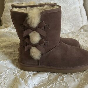 Kookaburra by Ugg, made in Australia. Never worn, mint condition.